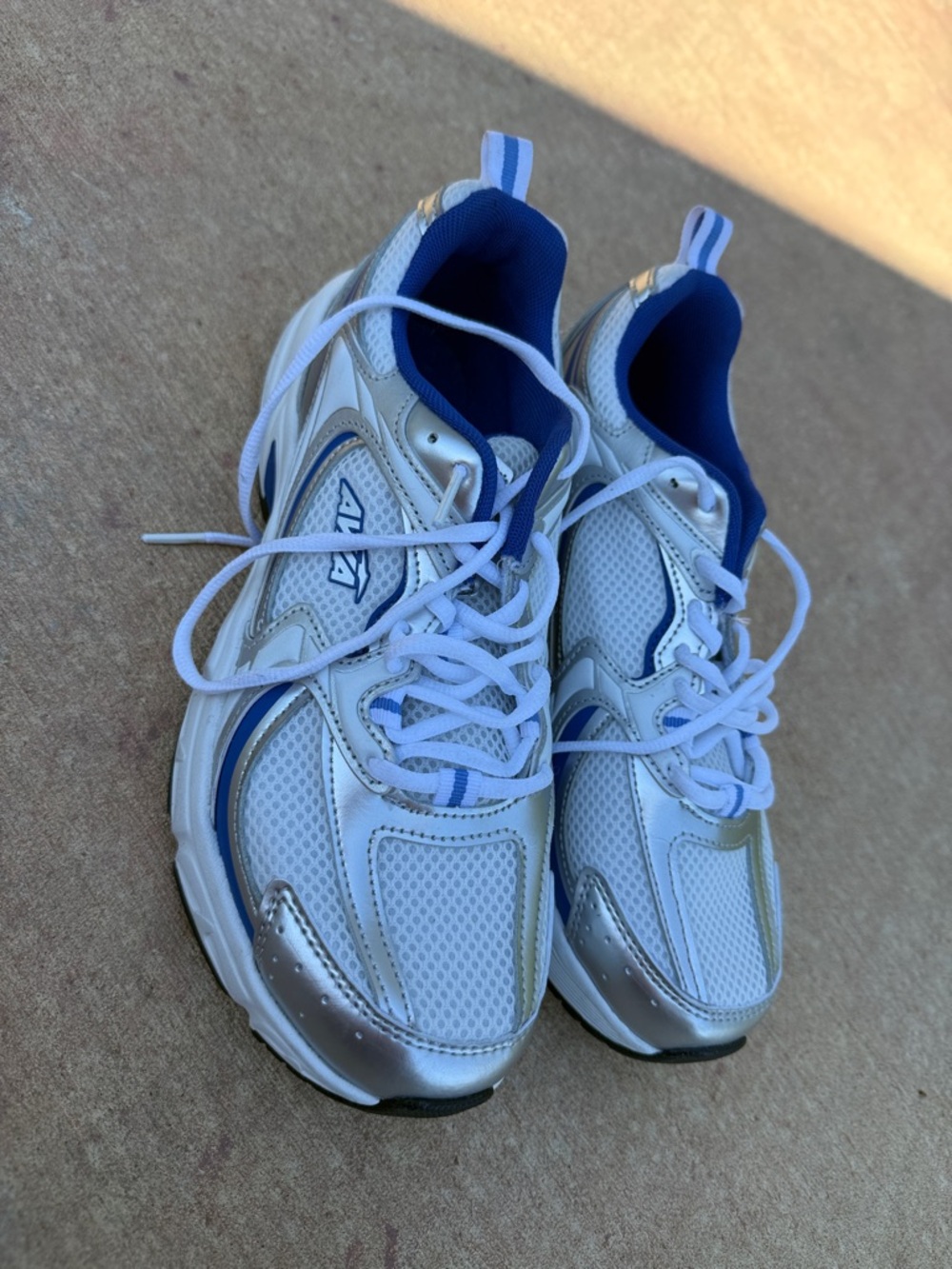 White and Blue Athletic Sneakers